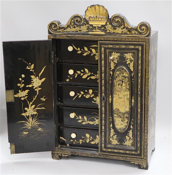 An early 19th century Chinese export black lacquer cabinet height 48cm width 30cm